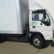 We use 14ft Covered Box Trucks with lift gate. 